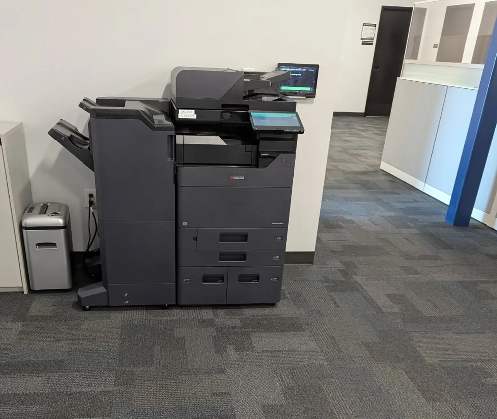 Kyocera multifunction printer with finisher, delivered and installed by Officegeeker